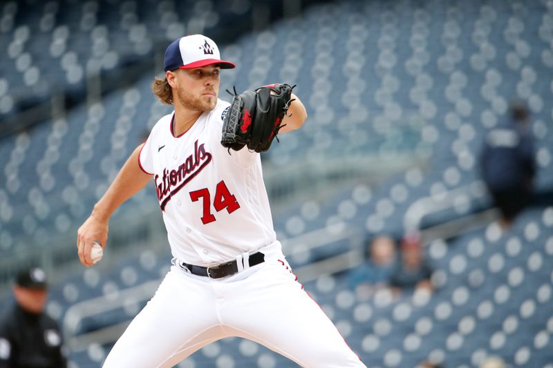 Jun 22, 2023; Washington, District of Columbia, USA; Washington Nationals starting pitcher Jake Irvin (74) throws the ball during the first inning against the Arizona Diamondbacks at Nationals Park. Mandatory Credit: Amber Searls-USA TODAY Sports