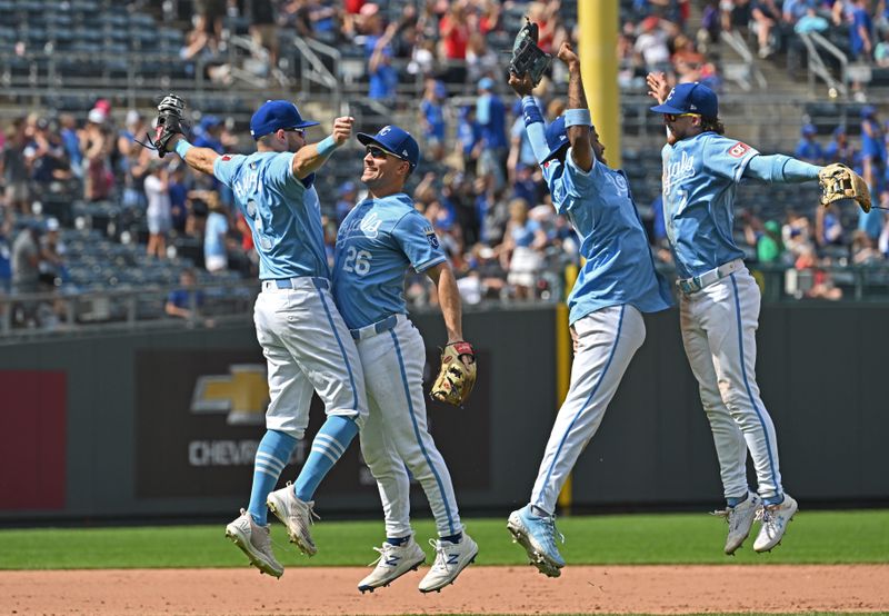 May 8, 2024; Kansas City, Missouri, USA;  Kansas City Royals Garrett Hampson (2), Adam Frazier (26), Maikel Garcia (11) and Bobby Witt Jr. (7) celebrate after beating the Milwaukee Brewers at Kauffman Stadium. Mandatory Credit: Peter Aiken-USA TODAY Sports