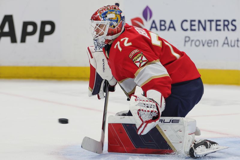 Oct 17, 2024; Sunrise, Florida, USA; Florida Panthers goaltender Sergei Bobrovsky (72) makes a save against the Vancouver Canucks during the second period at Amerant Bank Arena. Mandatory Credit: Sam Navarro-Imagn Images