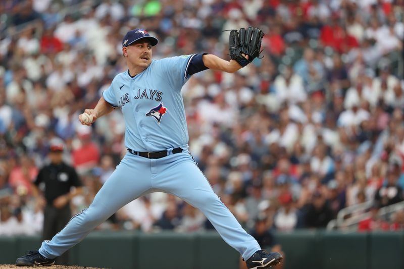 Oct 3, 2023; Minneapolis, Minnesota, USA; Toronto Blue Jays relief pitcher Erik Swanson (50) delvers a pitch in the fifth inning against the Minnesota Twins during game one of the Wildcard series for the 2023 MLB playoffs at Target Field. Mandatory Credit: Jesse Johnson-USA TODAY Sports