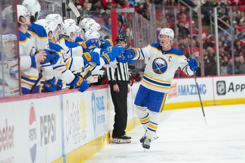 Jan 19, 2026; Raleigh, North Carolina, USA;  Buffalo Sabres defenseman Rasmus Dahlin (26) celebrates his goal against the Carolina Hurricanes during the first period at Lenovo Center. Mandatory Credit: James Guillory-Imagn Images