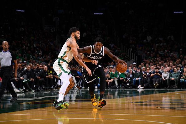 BOSTON, MA - NOVEMBER 10: Dorian Finney-Smith #28 of the Brooklyn Nets drives against Jayson Tatum #0 of the Boston Celtics during the In-Season Tournament on November 10, 2023 at the TD Garden in Boston, Massachusetts. NOTE TO USER: User expressly acknowledges and agrees that, by downloading and or using this photograph, User is consenting to the terms and conditions of the Getty Images License Agreement. Mandatory Copyright Notice: Copyright 2023 NBAE  (Photo by Brian Babineau/NBAE via Getty Images)