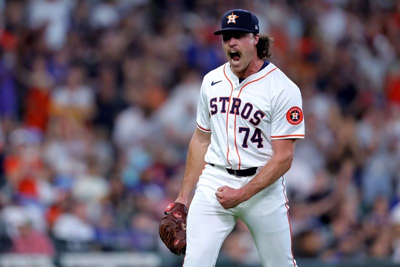 Jul 13, 2024; Houston, Texas, USA; Houston Astros pitcher Bryan King (74) reacts after a strikeout against the Texas Rangers during the seventh inning at Minute Maid Park. Mandatory Credit: Erik Williams-USA TODAY Sports
