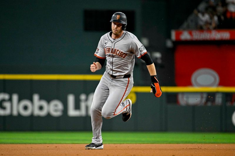 Jun 8, 2024; Arlington, Texas, USA; San Francisco Giants right fielder Austin Slater (13) scores from first base during the first inning against the Texas Rangers at Globe Life Field. Mandatory Credit: Jerome Miron-USA TODAY Sports