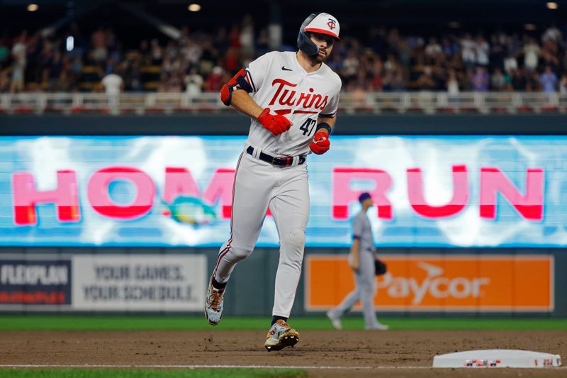 Aug 25, 2023; Minneapolis, Minnesota, USA; Minnesota Twins designated hitter Edouard Julien (47) runs the bases on his three-run home run against the Texas Rangers in the seventh inning at Target Field. Mandatory Credit: Bruce Kluckhohn-USA TODAY Sports