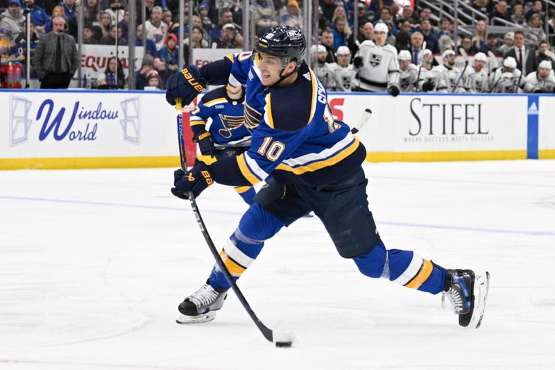 Jan 28, 2024; St. Louis, Missouri, USA; St. Louis Blues center Brayden Schenn (10) takes a shot against the Los Angeles Kings during the second period at Enterprise Center. Mandatory Credit: Jeff Le-USA TODAY Sports