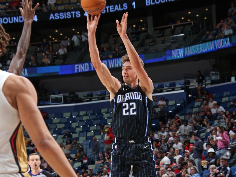 NEW ORLEANS, LA - OCTOBER 10: Franz Wagner #22 of the Orlando Magic shoots a three point basket against the New Orleans Pelicans on October 10, 2023 at the Smoothie King Center in New Orleans, Louisiana. NOTE TO USER: User expressly acknowledges and agrees that, by downloading and or using this Photograph, user is consenting to the terms and conditions of the Getty Images License Agreement. Mandatory Copyright Notice: Copyright 2023 NBAE (Photo by Layne Murdoch Jr./NBAE via Getty Images)