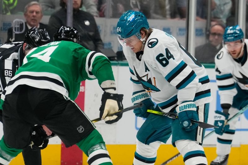 Mar 2, 2024; Dallas, Texas, USA;  San Jose Sharks center Mikael Granlund (64) gets set during a faceoff against the Dallas Stars during the first period at American Airlines Center. Mandatory Credit: Chris Jones-USA TODAY Sports