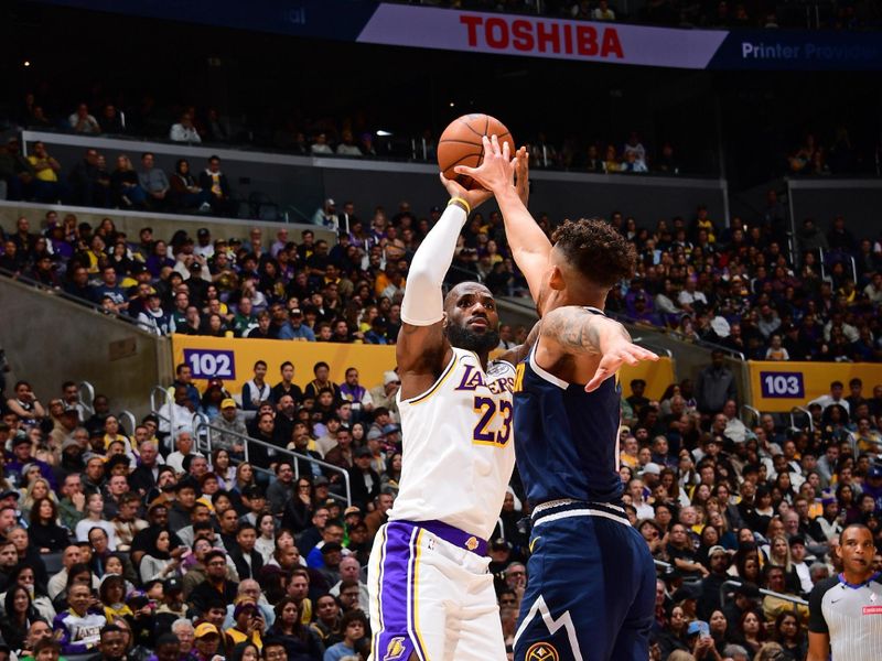 LOS ANGELES, CA - NOVEMBER 23: LeBron James #23 of the Los Angeles Lakers shoots the ball during the game against the Denver Nuggets on November 23, 2024 at Crypto.Com Arena in Los Angeles, California. NOTE TO USER: User expressly acknowledges and agrees that, by downloading and/or using this Photograph, user is consenting to the terms and conditions of the Getty Images License Agreement. Mandatory Copyright Notice: Copyright 2024 NBAE (Photo by Adam Pantozzi/NBAE via Getty Images)