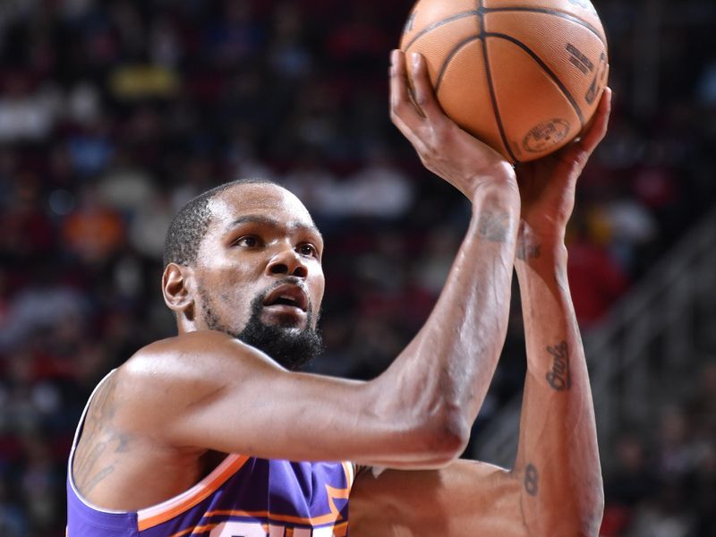 HOUSTON, TX - FEBRUARY 12: Kevin Durant #35 of the Phoenix Suns shoots a free throw during the game against the Houston Rockets on February 12, 2025 at the Toyota Center in Houston, Texas. NOTE TO USER: User expressly acknowledges and agrees that, by downloading and or using this photograph, User is consenting to the terms and conditions of the Getty Images License Agreement. Mandatory Copyright Notice: Copyright 2025 NBAE (Photo by Logan Riely/NBAE via Getty Images)