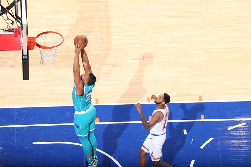 NEW YORK, NY - OCTOBER 15: Grant Williams #2 of the Charlotte Hornets dunks the ball during the game against the New York Knicks during the 2024 NBA Preseason on October 15, 2024 at Madison Square Garden in New York City, New York.  NOTE TO USER: User expressly acknowledges and agrees that, by downloading and or using this photograph, User is consenting to the terms and conditions of the Getty Images License Agreement. Mandatory Copyright Notice: Copyright 2024 NBAE  (Photo by Nathaniel S. Butler/NBAE via Getty Images)