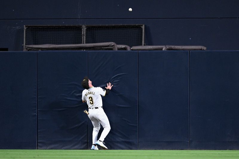 Jun 20, 2024; San Diego, California, USA; San Diego Padres center fielder Jackson Merrill (3) watches the two-run home run hit by Milwaukee Brewers shortstop Willy Adames (27) during the fifth inning at Petco Park. Mandatory Credit: Orlando Ramirez-USA TODAY Sports