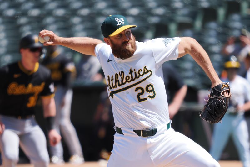 May 1, 2024; Oakland, California, USA; Oakland Athletics relief pitcher Austin Adams (29) pitches the ball against the Pittsburgh Pirates during the seventh inning at Oakland-Alameda County Coliseum. Mandatory Credit: Kelley L Cox-USA TODAY Sports