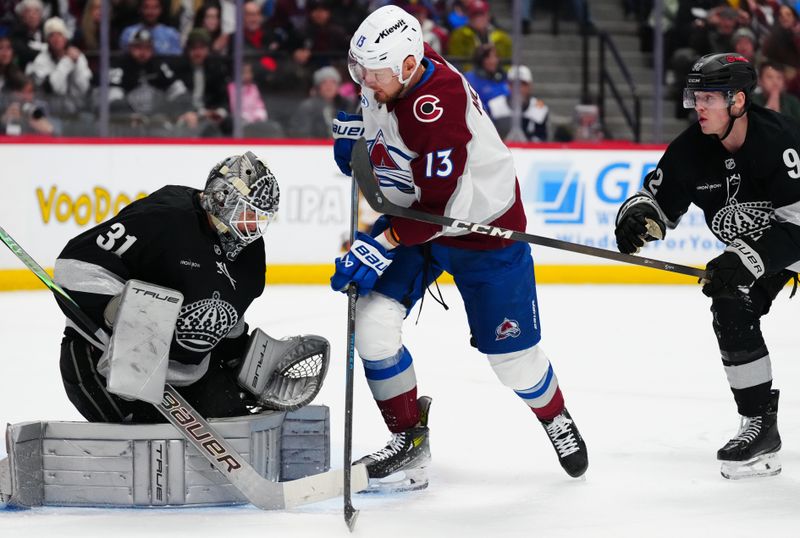Dec 29, 2025; Denver, Colorado, USA; Los Angeles Kings goaltender Anton Forsberg (31) makes a save on Colorado Avalanche right wing Valeri Nichushkin (13) in the second period at Ball Arena. Mandatory Credit: Ron Chenoy-Imagn Images