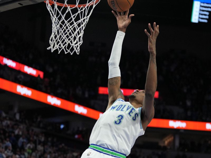 MINNEAPOLIS, MN -  JANUARY 18: Jaden McDaniels #3 of the Minnesota Timberwolves shoots the ball during the game against the Memphis Grizzlies on January 18, 2024 at Target Center in Minneapolis, Minnesota. NOTE TO USER: User expressly acknowledges and agrees that, by downloading and or using this Photograph, user is consenting to the terms and conditions of the Getty Images License Agreement. Mandatory Copyright Notice: Copyright 2024 NBAE (Photo by Jordan Johnson/NBAE via Getty Images)