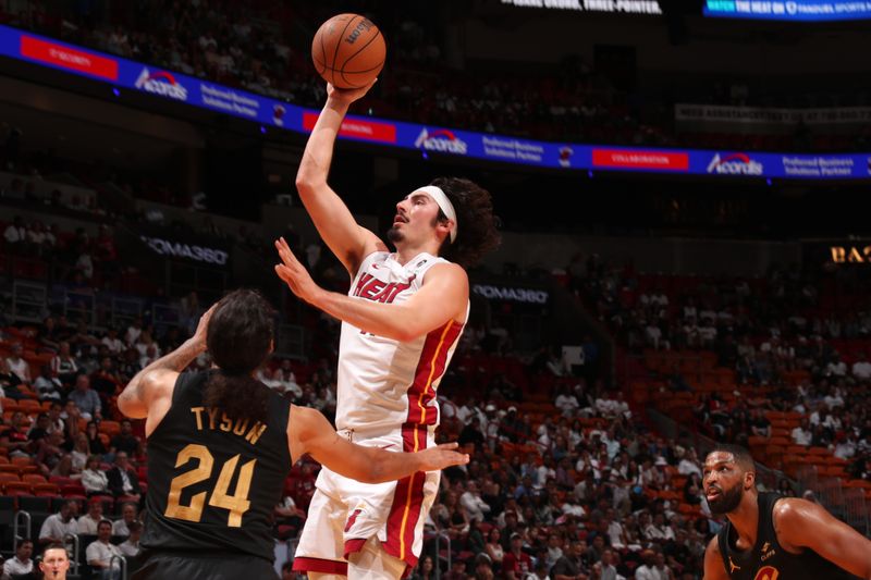 MIAMI, FL - APRIL 28:  Jaime Jaquez Jr. #11 of the Miami Heat shoots the ball during the game against the Cleveland Cavaliers during Round 1 Game 4 on April 28, 2025 at Kaseya Center in Miami, Florida. NOTE TO USER: User expressly acknowledges and agrees that, by downloading and or using this Photograph, user is consenting to the terms and conditions of the Getty Images License Agreement. Mandatory Copyright Notice: Copyright 2025 NBAE (Photo by Issac Baldizon/NBAE via Getty Images)