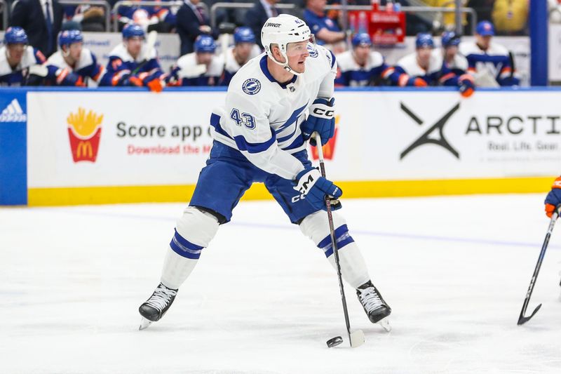 Feb 24, 2024; Elmont, New York, USA;  Tampa Bay Lightning defenseman Darren Raddysh (43) controls the puck in the second period against the New York Islanders at UBS Arena. Mandatory Credit: Wendell Cruz-USA TODAY Sports