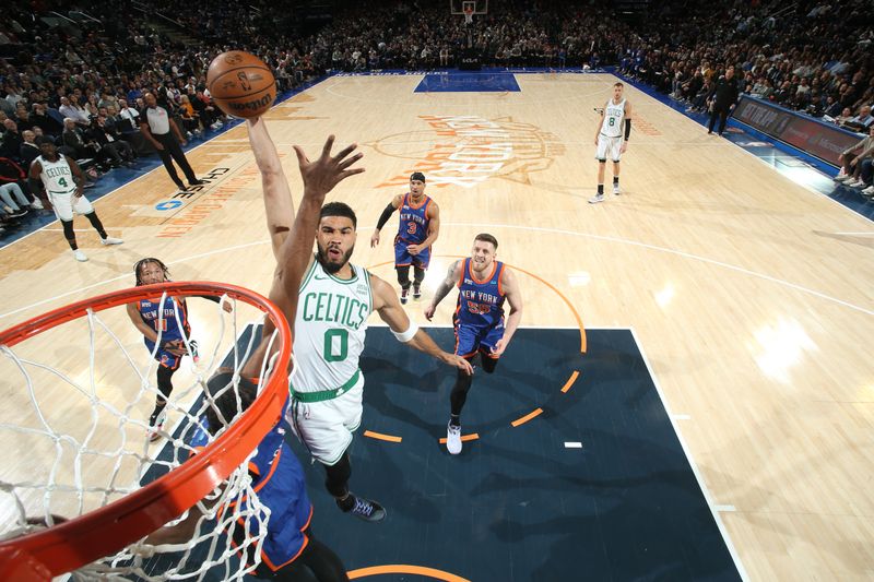 NEW YORK, NY - FEBRUARY 24: Jayson Tatum #0 of the Boston Celtics drives to the basket during the game against the New York Knicks on February 24, 2024 at Madison Square Garden in New York City, New York.  NOTE TO USER: User expressly acknowledges and agrees that, by downloading and or using this photograph, User is consenting to the terms and conditions of the Getty Images License Agreement. Mandatory Copyright Notice: Copyright 2024 NBAE  (Photo by Nathaniel S. Butler/NBAE via Getty Images)