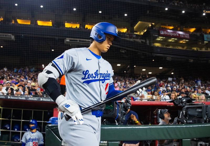 Apr 30, 2024; Phoenix, Arizona, USA; Los Angeles Dodgers designated hitter Shohei Ohtani in the first inning against the Arizona Diamondbacks at Chase Field. Mandatory Credit: Mark J. Rebilas-USA TODAY Sports