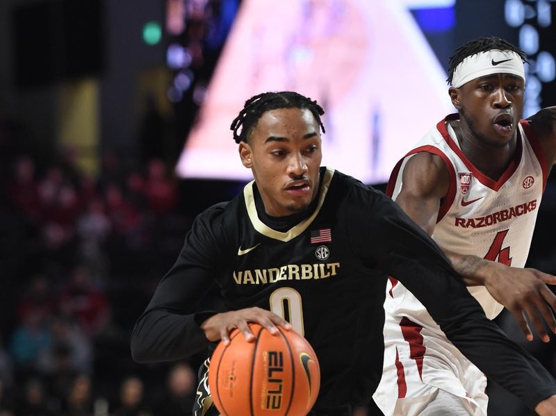 Jan 14, 2023; Nashville, Tennessee, USA; Vanderbilt Commodores guard Tyrin Lawrence (0) drives to the basket against the Arkansas Razorbacks during the first half at Memorial Gymnasium. Mandatory Credit: Christopher Hanewinckel-USA TODAY Sports