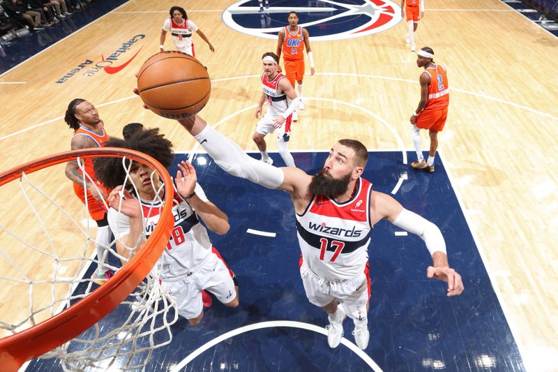 WASHINGTON, DC -? JANUARY 12: Jonas Valanciunas #17 of the Washington Wizards rebounds during the game against the Oklahoma City Thunder on January 12, 2025 at Capital One Arena in Washington, DC. NOTE TO USER: User expressly acknowledges and agrees that, by downloading and or using this Photograph, user is consenting to the terms and conditions of the Getty Images License Agreement. Mandatory Copyright Notice: Copyright 2025 NBAE (Photo by Stephen Gosling/NBAE via Getty Images)<p><br/></p>