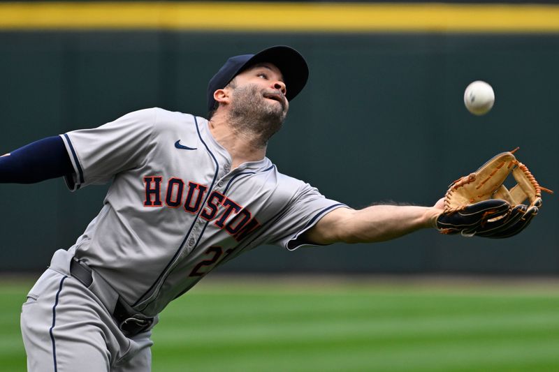 Jun 20, 2024; Chicago, Illinois, USA;  Houston Astros second base Jose Altuve (27) canít make the play on the ball hit by Chicago White Sox catcher Martin Maldonado (15) during the fifth inning at Guaranteed Rate Field. Mandatory Credit: Matt Marton-USA TODAY Sports