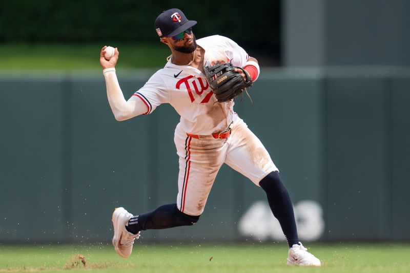 Jul 21, 2024; Minneapolis, Minnesota, USA; Minnesota Twins shortstop Willi Castro (50) throws to first base in the fifth inning against the Milwaukee Brewers at Target Field. Mandatory Credit: Matt Blewett-USA TODAY Sports