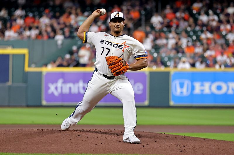 Sep 1, 2025; Houston, Texas, USA; Houston Astros starting pitcher Luis Garcia (77) delivers a pitch against the Los Angeles Angels during the first inning at Daikin Park. Mandatory Credit: Erik Williams-Imagn Images