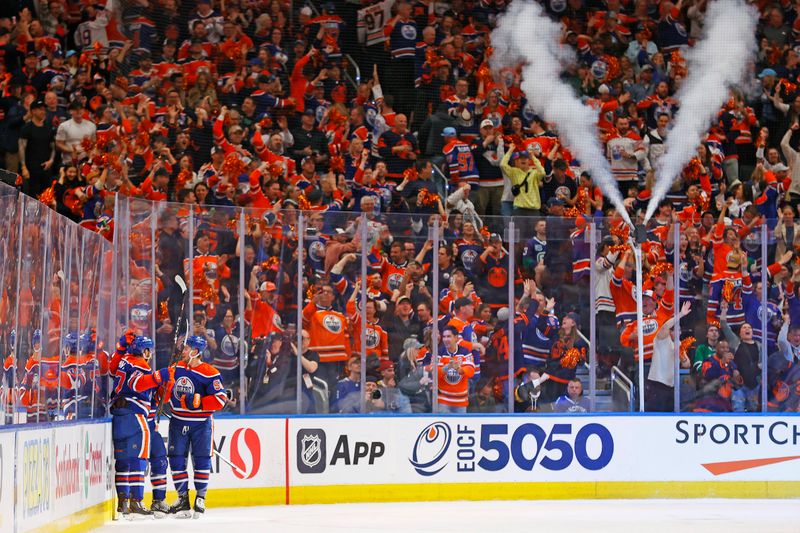 May 14, 2024; Edmonton, Alberta, CAN; The Edmonton Oilers celebrate a goal scored by forward Ryan Nugent-Hopkins (93) during the second period against the Vancouver Canucks in game four of the second round of the 2024 Stanley Cup Playoffs at Rogers Place. Mandatory Credit: Perry Nelson-USA TODAY Sports