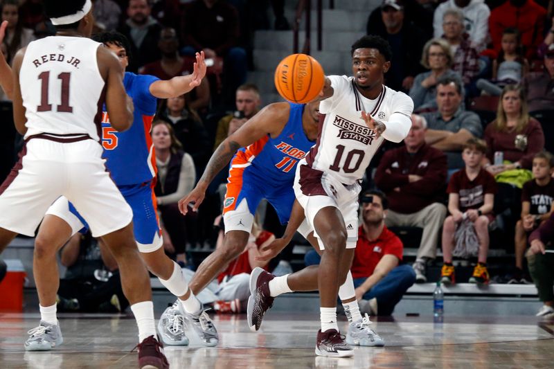 Jan 21, 2023; Starkville, Mississippi, USA; Mississippi State Bulldogs guard Dashawn Davis (10) passes during the first half against the Florida Gators at Humphrey Coliseum. Mandatory Credit: Petre Thomas-USA TODAY Sports