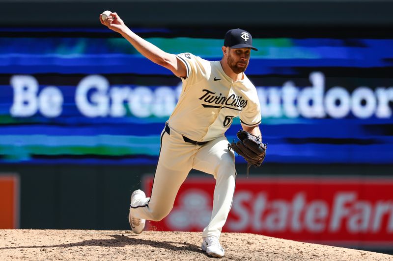 Apr 25, 2024; Minneapolis, Minnesota, USA; Minnesota Twins relief pitcher Brock Stewart (61) delivers a pitch against the Chicago White Sox during the eighth inning at Target Field. Mandatory Credit: Matt Krohn-USA TODAY Sports