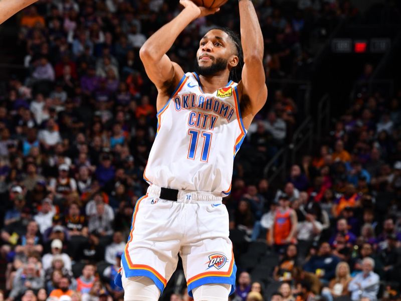 PHOENIX, AZ - MARCH 3: Isaiah Joe #11 of the Oklahoma City Thunder shoots the ball during the game against the Phoenix Suns on March 3, 2024 at Footprint Center in Phoenix, Arizona. NOTE TO USER: User expressly acknowledges and agrees that, by downloading and or using this photograph, user is consenting to the terms and conditions of the Getty Images License Agreement. Mandatory Copyright Notice: Copyright 2024 NBAE (Photo by Barry Gossage/NBAE via Getty Images)