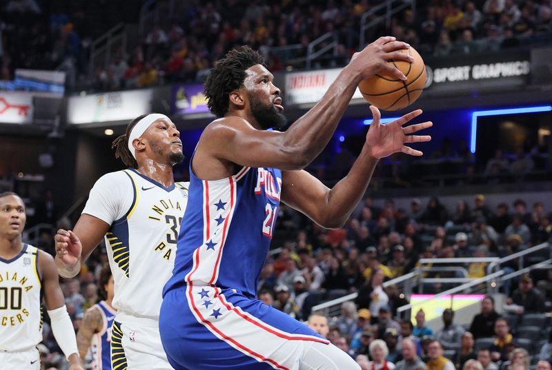 INDIANAPOLIS, INDIANA - JANUARY 25: Joel Embiid #21of the Philadelphia 76ers shoots the ball during the first half against the Indiana Pacers at Gainbridge Fieldhouse on January 25, 2024 in Indianapolis, Indiana.    NOTE TO USER: User expressly acknowledges and agrees that, by downloading and or using this photograph, User is consenting to the terms and conditions of the Getty Images License Agreement.  (Photo by Andy Lyons/Getty Images)