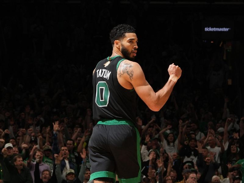 BOSTON, MA - JUNE 9: Jayson Tatum #0 of the Boston Celtics celebrates during the game against the Dallas Mavericks during Game 2 of the 2024 NBA Finals on June 9, 2024 at the TD Garden in Boston, Massachusetts. NOTE TO USER: User expressly acknowledges and agrees that, by downloading and or using this photograph, User is consenting to the terms and conditions of the Getty Images License Agreement. Mandatory Copyright Notice: Copyright 2024 NBAE  (Photo by Jesse D. Garrabrant/NBAE via Getty Images)