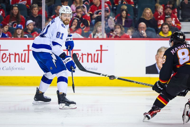 Jan 21, 2023; Calgary, Alberta, CAN; Tampa Bay Lightning defenseman Erik Cernak (81) passes the puck against the Calgary Flames during the second period at Scotiabank Saddledome. Mandatory Credit: Sergei Belski-USA TODAY Sports