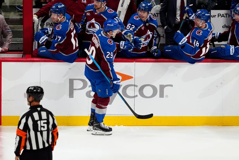 Oct 9, 2025; Denver, Colorado, USA; Colorado Avalanche center Nathan MacKinnon (29) celebrates his goal in the third period against the Utah Mammoth at Ball Arena. Mandatory Credit: Ron Chenoy-Imagn Images