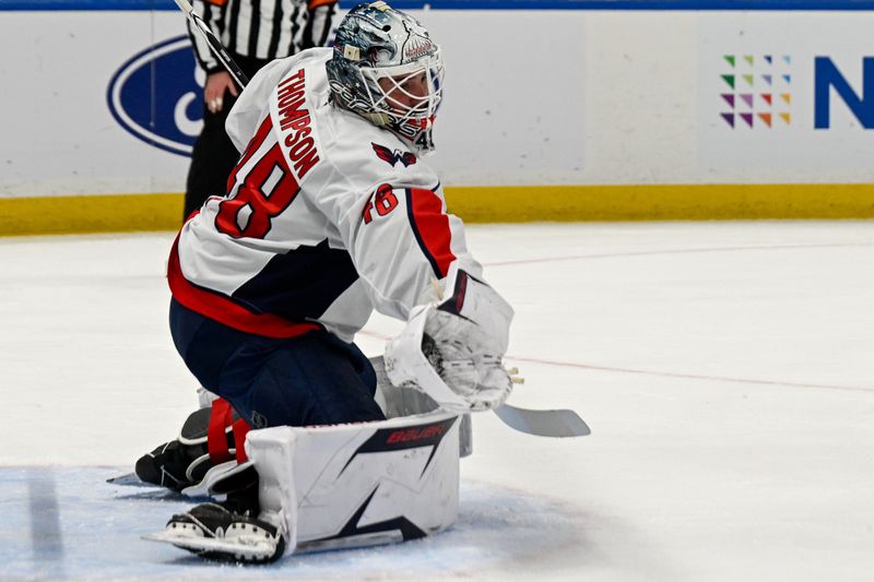 Nov 30, 2025; Elmont, New York, USA;  Washington Capitals goaltender Logan Thompson (48) makes a glove save against the New York Islanders during the second period at UBS Arena. Mandatory Credit: Dennis Schneidler-Imagn Images