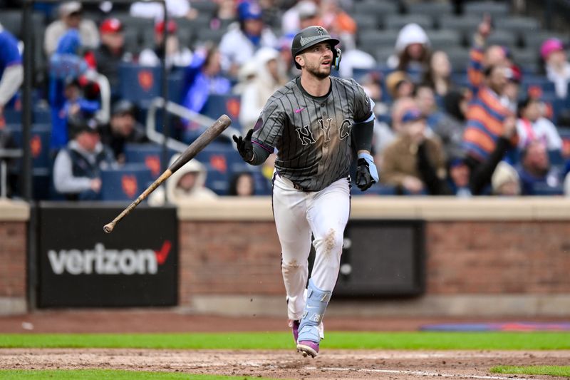 Apr 27, 2024; New York City, New York, USA; New York Mets first baseman Pete Alonso (20) hits a two run home run, his career 200th home run, during the fifth inning against the St. Louis Cardinals at Citi Field. Mandatory Credit: John Jones-USA TODAY Sports