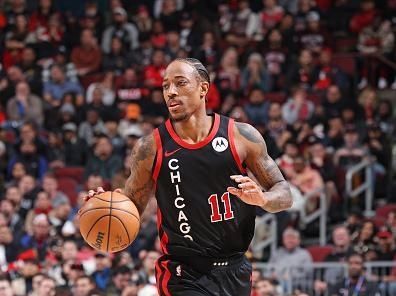 CHICAGO, IL - DECEMBER 21: DeMar DeRozan #11 of the Chicago Bulls drives to the basket during the game against the San Antonio Spurs on December 21, 2023 at United Center in Chicago, Illinois. NOTE TO USER: User expressly acknowledges and agrees that, by downloading and or using this photograph, User is consenting to the terms and conditions of the Getty Images License Agreement. Mandatory Copyright Notice: Copyright 2023 NBAE (Photo by Jeff Haynes/NBAE via Getty Images)