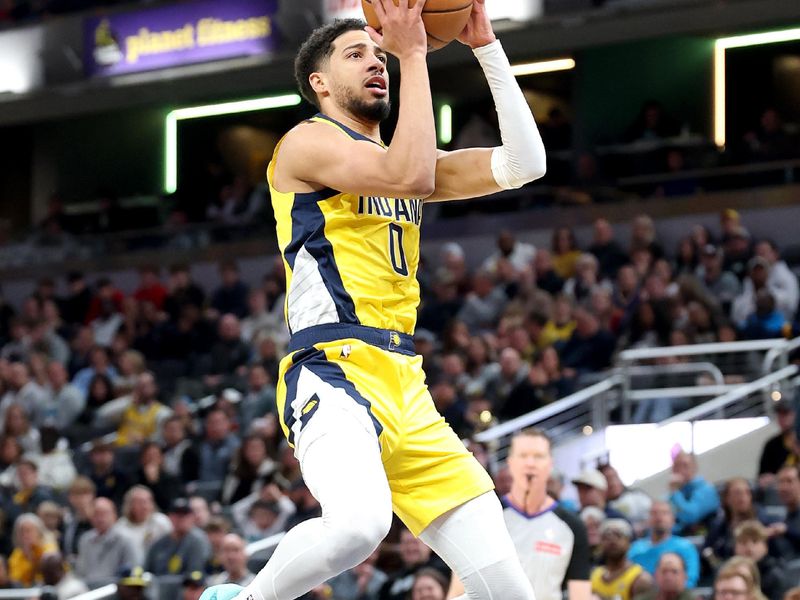 INDIANAPOLIS, INDIANA - JANUARY 10: Tyrese Haliburton #0 of the Indiana Pacers shoots the ball against the Golden State Warriors at Gainbridge Fieldhouse on January 10, 2025 in Indianapolis, Indiana.     NOTE TO USER: User expressly acknowledges and agrees that, by downloading and or using this photograph, User is consenting to the terms and conditions of the Getty Images License Agreement. (Photo by Andy Lyons/Getty Images)