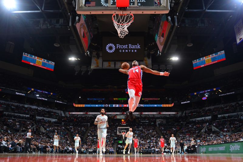 SAN ANTONIO, TX - MARCH 21:   Ricky Council IV #14 of the Philadelphia 76ers dunks the ball during the game against the San Antonio Spurs  on March 21, 2025 at the Frost Bank Center in San Antonio, Texas. NOTE TO USER: User expressly acknowledges and agrees that, by downloading and or using this photograph, user is consenting to the terms and conditions of the Getty Images License Agreement. Mandatory Copyright Notice: Copyright 2025 NBAE (Photos by Michael Gonzales/NBAE via Getty Images)