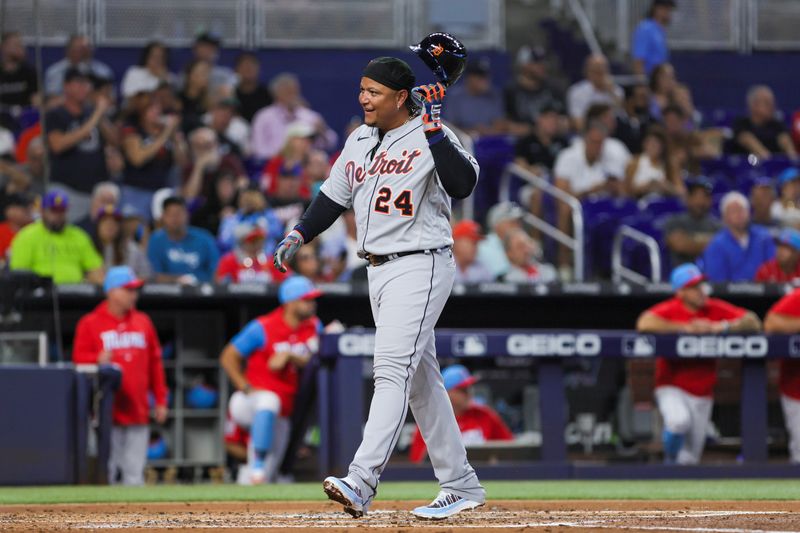 Jul 29, 2023; Miami, Florida, USA; Detroit Tigers designated hitter Miguel Cabrera (24) reacts after crossing home plate against the Miami Marlins during the second inning at loanDepot Park. Mandatory Credit: Sam Navarro-USA TODAY Sports