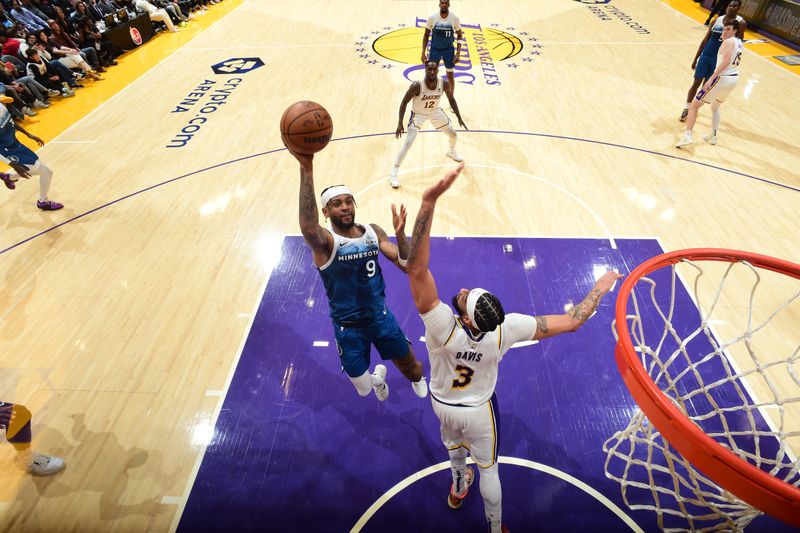 LOS ANGELES, CA - MARCH 10: Nickeil Alexander-Walker #9 of the Minnesota Timberwolves shoots the ball during the game against the Los Angeles Lakers on March 10, 2024 at Crypto.Com Arena in Los Angeles, California. NOTE TO USER: User expressly acknowledges and agrees that, by downloading and/or using this Photograph, user is consenting to the terms and conditions of the Getty Images License Agreement. Mandatory Copyright Notice: Copyright 2024 NBAE (Photo by Adam Pantozzi/NBAE via Getty Images)