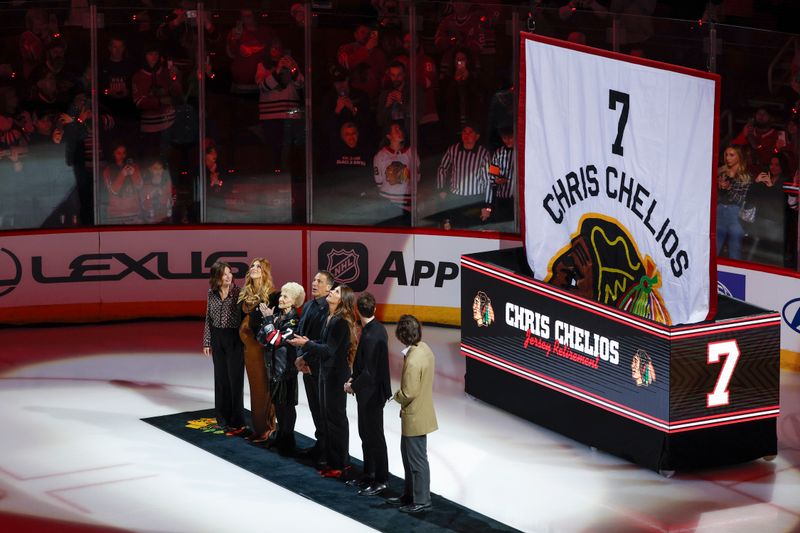 Feb 25, 2024; Chicago, Illinois, USA; Former Chicago Blackhawks great Chris Chelios attends with family his jersey retirement ceremony before an NHL hockey game between the Chicago Blackhawks and Detroit Red Wings at United Center. Mandatory Credit: Kamil Krzaczynski-USA TODAY Sports