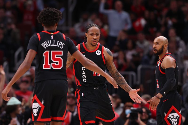 CHICAGO, ILLINOIS - JANUARY 30: DeMar DeRozan #11 of the Chicago Bulls celebrates a dunk against the Toronto Raptors during the second half at the United Center on January 30, 2024 in Chicago, Illinois. NOTE TO USER: User expressly acknowledges and agrees that, by downloading and or using this photograph, User is consenting to the terms and conditions of the Getty Images License Agreement.  (Photo by Michael Reaves/Getty Images)