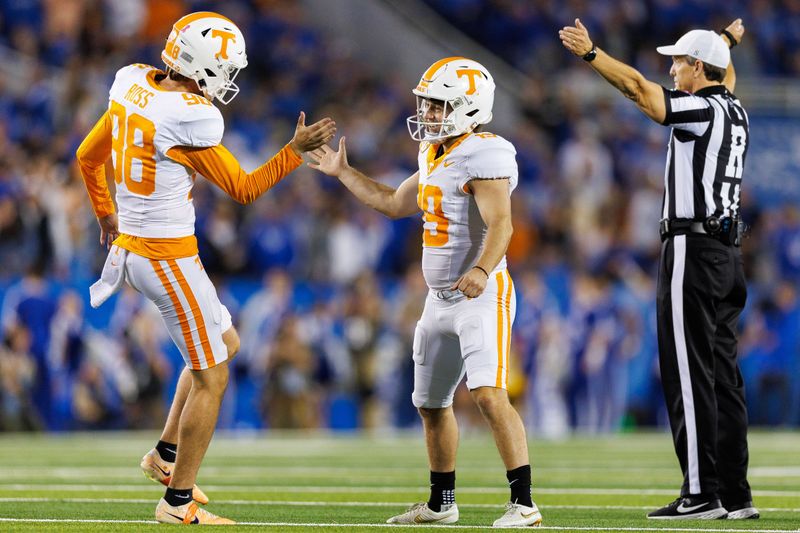 Oct 28, 2023; Lexington, Kentucky, USA; Tennessee Volunteers punter Jackson Ross (98) celebrates with place kicker Charles Campbell (19) after a field goal during the third quarter against the Kentucky Wildcats at Kroger Field. Mandatory Credit: Jordan Prather-USA TODAY Sports