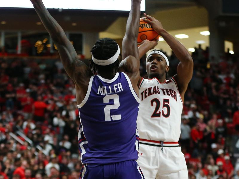 Feb 20, 2024; Lubbock, Texas, USA;  Texas Tech Red Raiders forward Robert Jennings (25) takes a shot over TCU Horned Frogs forward Emanuel Miller (2) in the second half at United Supermarkets Arena. Mandatory Credit: Michael C. Johnson-USA TODAY Sports