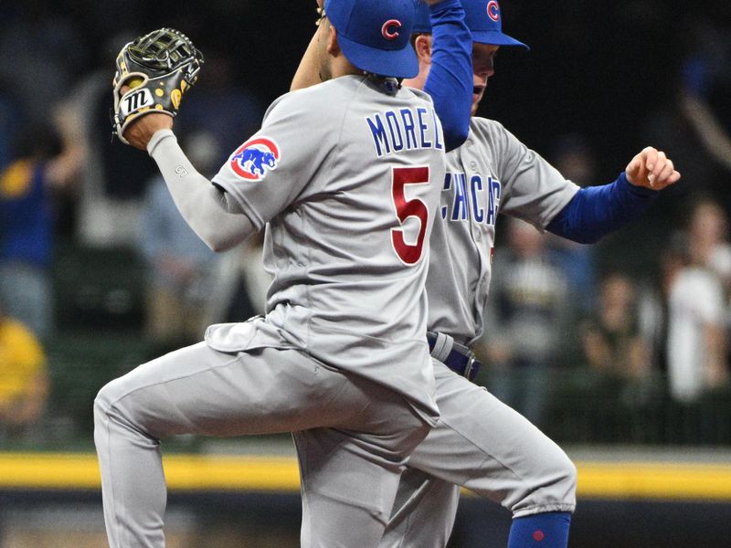 Sep 30, 2023; Milwaukee, Wisconsin, USA; Chicago Cubs second baseman Christopher Morel (5) and Chicago Cubs center fielder Pete Crow-Armstrong (52) celebrate a 10-6 win over the Milwaukee Brewers  at American Family Field. Mandatory Credit: Michael McLoone-USA TODAY Sports