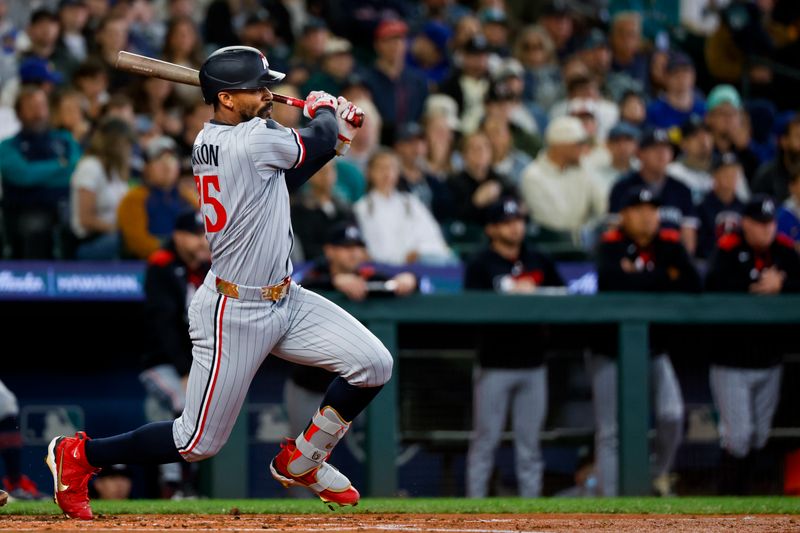 May 31, 2025; Seattle, Washington, USA; Minnesota Twins center fielder Byron Buxton (25) hits an RBI-single against the Seattle Mariners during the second inning at T-Mobile Park. Mandatory Credit: Joe Nicholson-Imagn Images