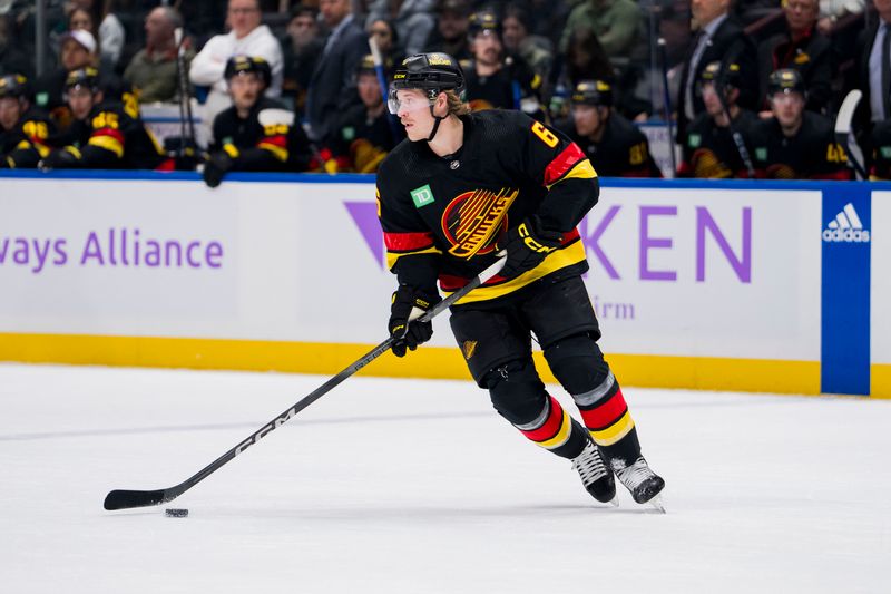 Nov 28, 2023; Vancouver, British Columbia, CAN; Vancouver Canucks forward Brock Boeser (6) handles the puck against the Anaheim Ducks in the first period at Rogers Arena. Mandatory Credit: Bob Frid-USA TODAY Sports